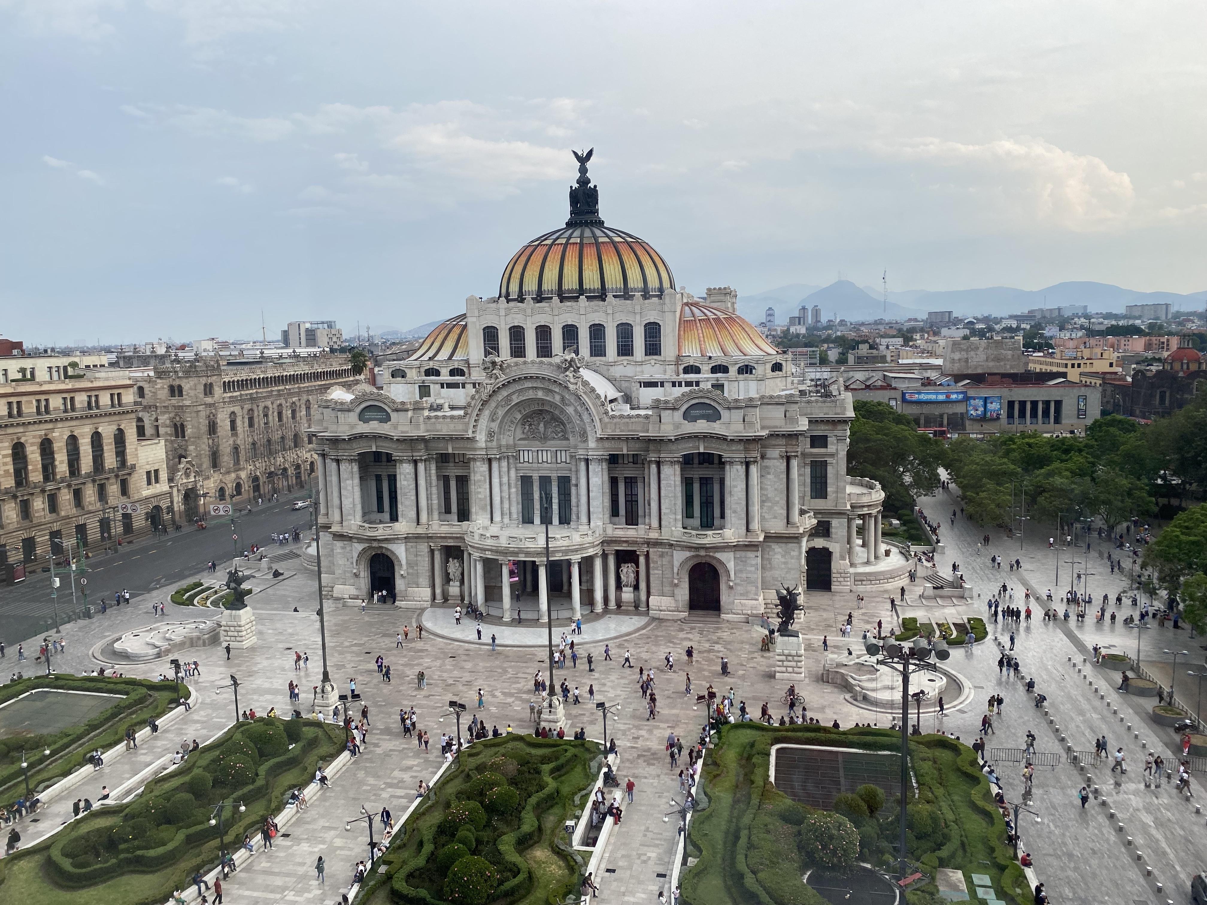 Palacio de Bellas Artes (Mexico) with mountain range visible in background